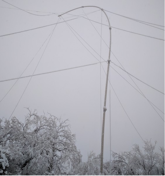 AA7FV: The weight of snow and ice on the antenna wire brought my rhombic antenna down, click to enlarge picture.